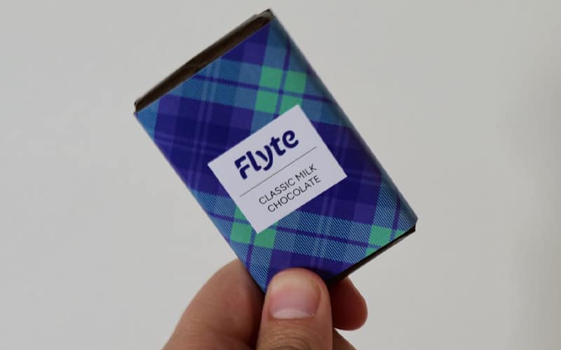 Flyte chocolate bar being held up Flyte chocolate bar being held up