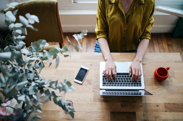 Home-working Woman working on a laptop in a home environment